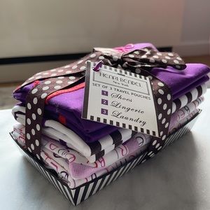 Henri Bendel set 3 travel pouches.
